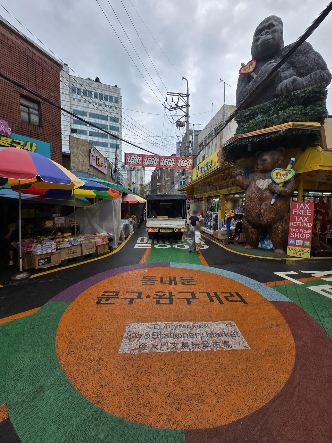 Colorful entrance lane at Dongdaemun Toy & Stationery Street with wholesale toy shops