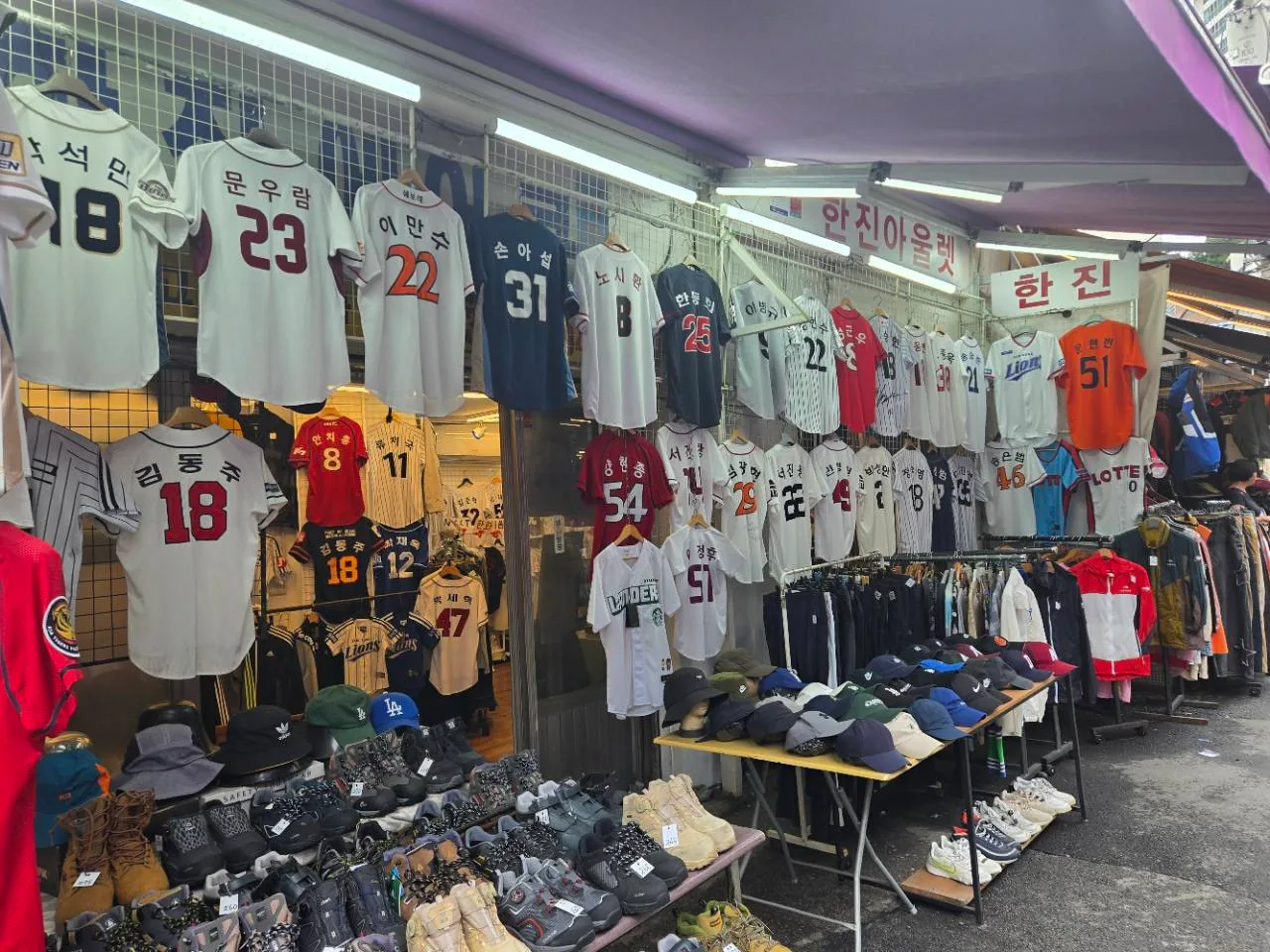 Korean baseball jerseys, caps and shoes displayed at Dongmyo Flea Market