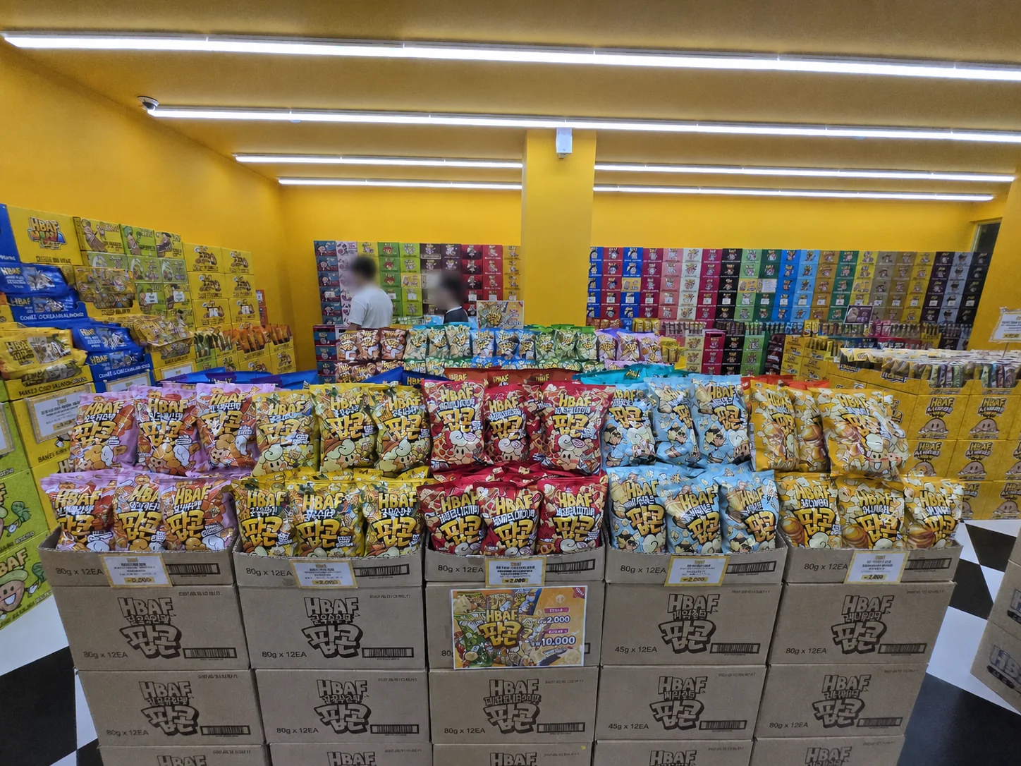 Colorful HBAF flavored almond bags displayed inside the Gwangjang Market store