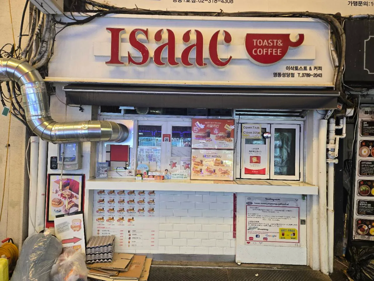 Isaac Toast Myeongdong Cathedral storefront with a 7 a.m. to 8 p.m. sign