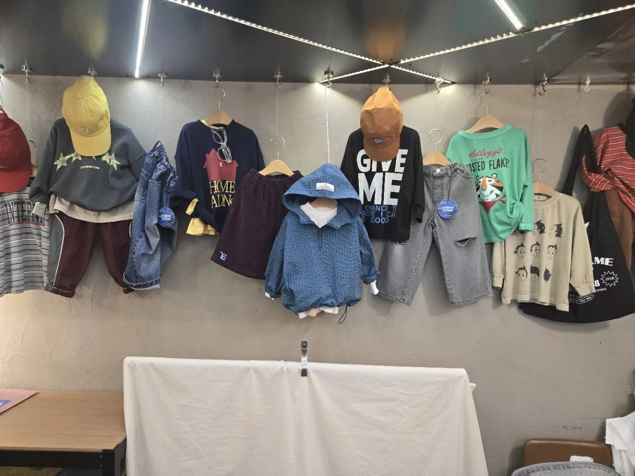 Children’s casual outfits displayed inside Namdaemun Market