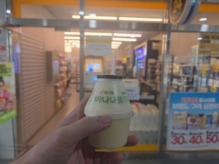 Holding banana milk inside a Korean convenience store