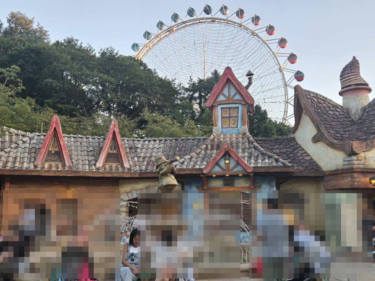 Visitors enjoying a themed ride area at Everland in Yongin