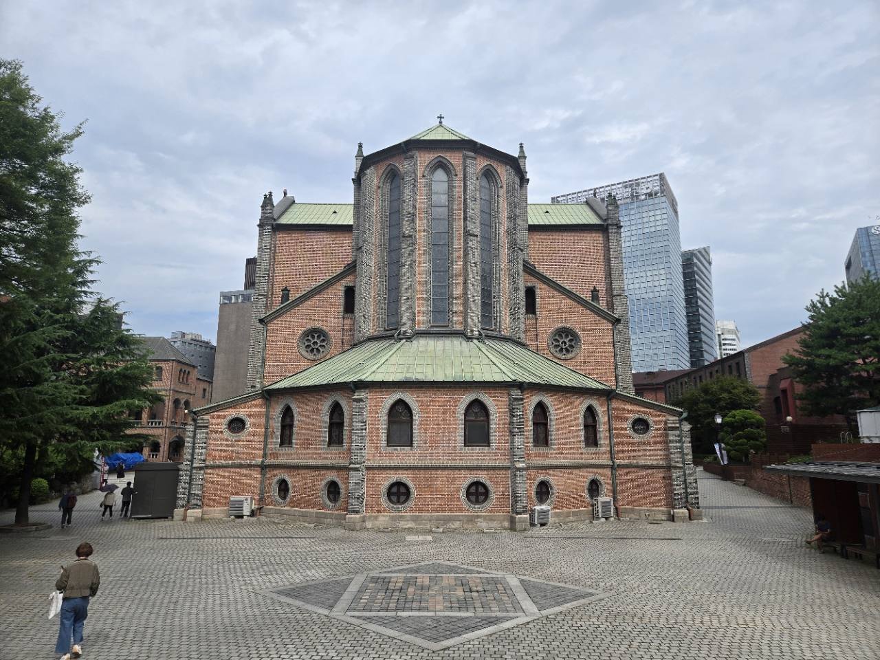 Rear apse and red-brick exterior of Myeongdong Cathedral in central Seoul